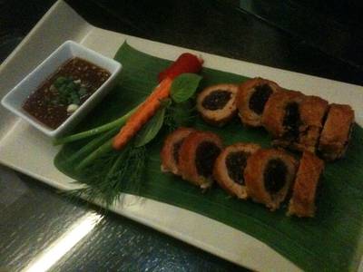 หมูย่างห่อข้าวเหนียว ที่ ร้านอาหาร Cafe Chilli Siam Paragon