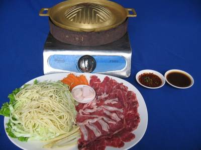 บาร์บีคิวเนื้อและหมูจุดเด่นที่น้ำจิ้มสูตรเด็ดอร่อยกว่าใคร ที่ ร้านอาหาร ร้านอาหารจานเปล