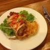Papaya & carrot salad with fried chicken & peanut ที่ ร้านอาหาร Amigos Restaurant
