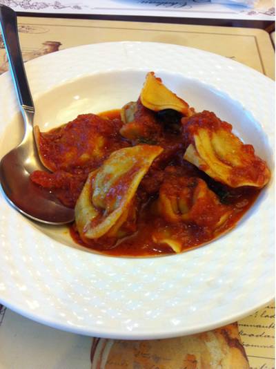 homemade ravioli with meat sauce ที่ ร้านอาหาร L'Opera