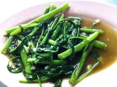 ผัดผักบุ้ง ที่ ร้านอาหาร ร้านข้าวต้มนายง้วน
