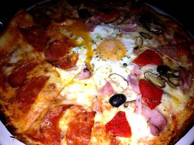 พิซซ่ารสชาติเเบบออริจิ  ที่ ร้านอาหาร Pomodoro