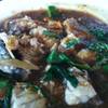ปลากระพงผัดฉ่า ที่ ร้านอาหาร ครัวลุงแว่น