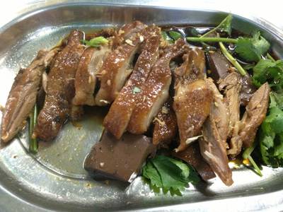 เป็ดดะโล่ เอาผักชีหลบใหเห็นเนื้อเป็ด at ข้าวต้มเป็ดเจ๊โอว
