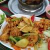หมึกไข่เค็ม.  ที่ ร้านอาหาร บ้านไม้ริมน้ำ