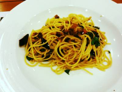 Spaghetti With bacon And Black Olive ที่ ร้านอาหาร The Village Garden Restaurant