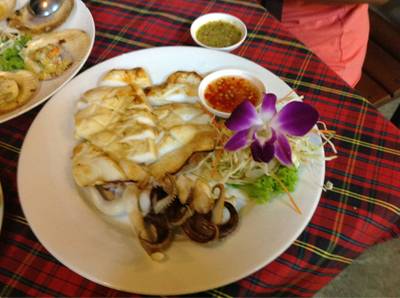 ปลาหมึกย่าง ที่ ร้านอาหาร ชาวเล ซีฟู๊ด ปลาหมึกย่าง ที่ ร้านอาหาร ชาวเล ซีฟู๊ด