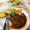 T-bone Steak With Peper Sauce And Cesar Slad ที่ ร้านอาหาร สเต็ก East & West