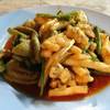 หมึกผัดไข่เค็ม ที่ ร้านอาหาร ชายเล